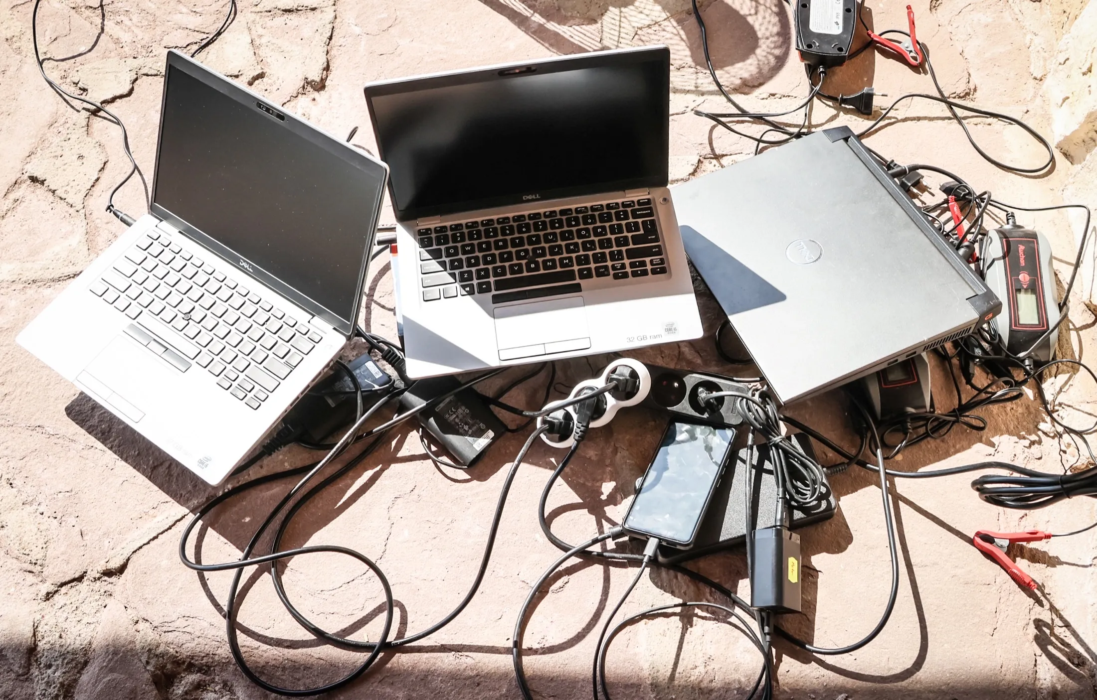 Cables and field computers connected on an outdoor table