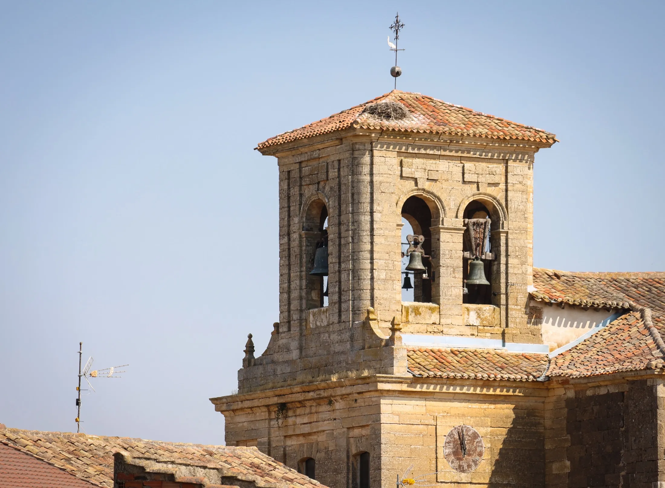 Stone church tower in Padilla de Abajo