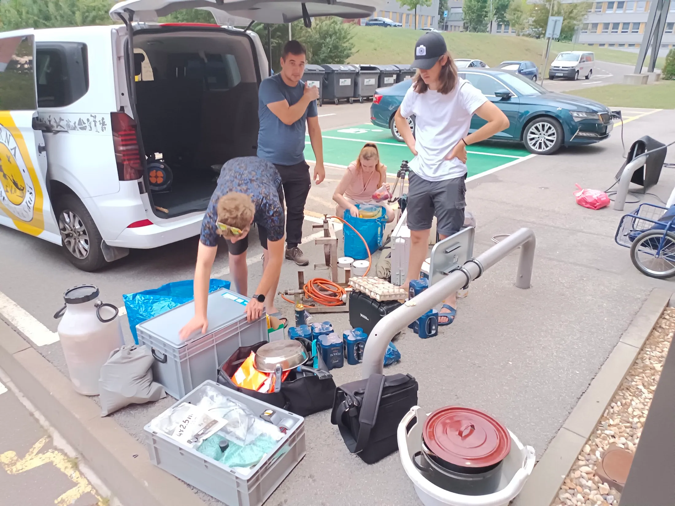 Team loading equipment into the expedition van
